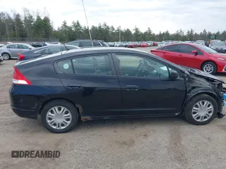 2010 Honda Insight LX with VIN JHMZE2H58AS014396, listed as a IAAI auction lot 42097224 with 167,505 mi miles and . Bid and sale history available at DreamBid. Image 14.