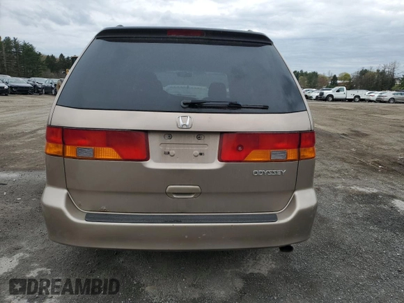 2003 Honda Odyssey EX-L z VIN 5FNRL18053B103431, wystawiony jako Copart lot #52580715 z przebiegiem Nie podano mil oraz Szkoda całkowita • Salvage title. Historia ofert i sprzedaży dostępna na DreamBid. Obrazek 6.