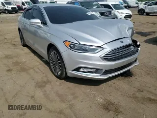 2017 Ford Fusion SE z VIN 3FA6P0HD0HR139771, wystawiony jako Copart lot #59438385 z przebiegiem 103 214 mil mil oraz Czysty tytuł • Clean title. Historia ofert i sprzedaży dostępna na DreamBid. Obrazek 13.