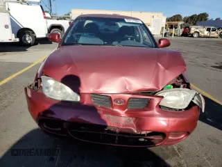 2000 Hyundai Elantra GLS z VIN KMHJF35F9YU919481, wystawiony jako Copart lot #79717924 z przebiegiem 137 918 mil mil oraz Szkoda całkowita • Salvage title. Historia ofert i sprzedaży dostępna na DreamBid. Obrazek 5.