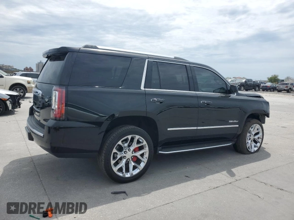 2017 GMC Yukon Denali with VIN 1GKS1CKJ9HR211240, listed as a Copart auction lot 50973015 with 95,484 mi miles and Salvage Title. Bid and sale history available at carsss.com. Image 3.