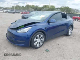 2022 Tesla Model Y Long Range z VIN 7SAYGDEE9NA002493, wystawiony jako IAAI lot #41756460 z przebiegiem 68 315 mil mil oraz . Historia ofert i sprzedaży dostępna na DreamBid. Obrazek 16.