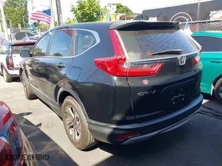 2017 Honda CR-V LX with VIN 7FARW5H30HE004035, listed as a IAAI auction lot 41836393 with 212,574 mi miles. Bid and sale history available at carsss.com. Image 3.