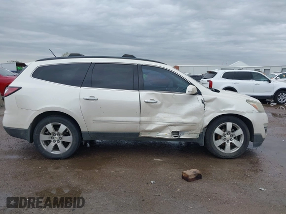 2014 Chevrolet Traverse LTZ with VIN 1GNKRJKD9EJ168099, listed as a IAAI auction lot 41955937 with 171,371 mi miles and . Bid and sale history available at DreamBid. Image 13.