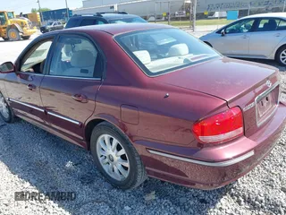 2003 Hyundai Sonata GLS with VIN KMHWF35H23A849193, listed as a IAAI auction lot 42023187 with 58,300 mi miles. Bid and sale history available at carsss.com. Image 3.