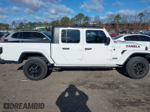 2022 Jeep Gladiator Willys with VIN 1C6HJTAG1NL117631, listed as a IAAI auction lot 41230291 with 33,463 mi miles and . Bid and sale history available at DreamBid. Image 13.