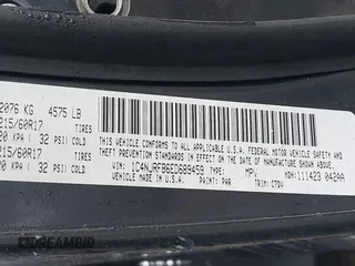 2014 Jeep Patriot Latitude with VIN 1C4NJRFB6ED689459, listed as a IAAI auction lot 42197469 with 202,899 mi miles. Bid and sale history available at carsss.com. Image 9.