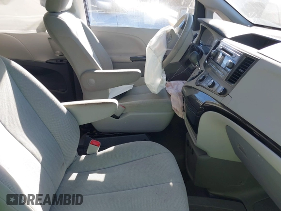 2012 Toyota Sienna with VIN 5TDZK3DC7CS270240, listed as a IAAI auction lot 40539452 with 92,738 mi miles. Bid and sale history available at carsss.com. Image 5.