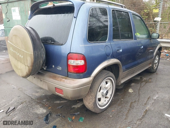 2002 Kia Sportage with VIN KNDJB723925161368, listed as a IAAI auction lot 41045568 with 168,167 mi miles. Bid and sale history available at carsss.com. Image 4.