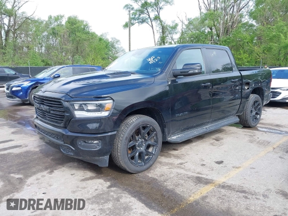 2023 Ram 1500 Laramie with VIN 1C6SRFJTXPN541328, listed as a IAAI auction lot 42121615 with 61,939 mi miles and . Bid and sale history available at DreamBid. Image 2.