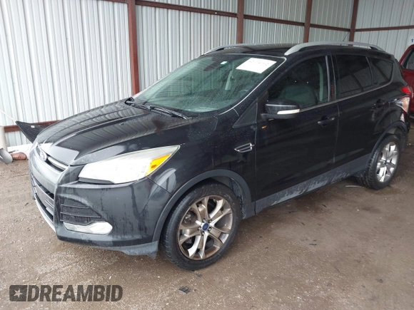 2014 Ford Escape Titanium z VIN 1FMCU0J96EUA84108, wystawiony jako IAAI lot #42114002 z przebiegiem 176 735 mil mil oraz . Historia ofert i sprzedaży dostępna na DreamBid. Obrazek 17.