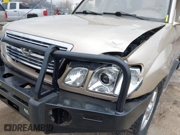 1999 Lexus LX 470 z VIN JT6HT00W8X0045705, wystawiony jako IAAI lot #42005587 z przebiegiem 443 758 mil mil oraz . Historia ofert i sprzedaży dostępna na DreamBid. Obrazek 6.
