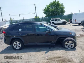2021 Toyota RAV4 XLE with VIN 2T3P1RFV4MC255062, listed as a IAAI auction lot 42371268 with 34,285 mi miles and . Bid and sale history available at DreamBid. Image 14.