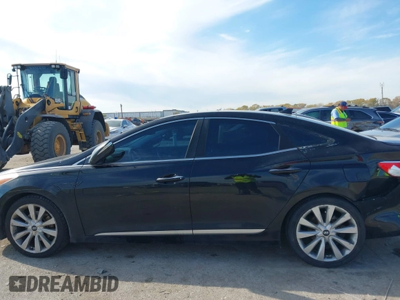 2014 Hyundai Azera Limited with VIN KMHFH4JG7EA353094, listed as a IAAI auction lot 41043222 with 184,924 mi miles and . Bid and sale history available at DreamBid. Image 14.