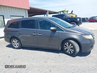 2014 Honda Odyssey EX-L with VIN 5FNRL5H6XEB111412, listed as a IAAI auction lot 41917361 with 210,841 mi miles and . Bid and sale history available at carsss.com. Image 13.