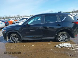 2020 Mazda CX-5 Touring with VIN JM3KFBCM5L0866189, listed as a IAAI auction lot 41829901 with 31,627 mi miles. Bid and sale history available at carsss.com. Image 14.