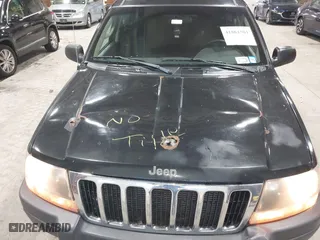 2003 Jeep Grand Cherokee Laredo with VIN 1J4GW48S63C552366, listed as a IAAI auction lot 41861501 with 227,464 mi miles. Bid and sale history available at carsss.com. Image 6.