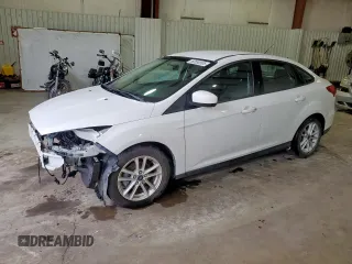 2018 Ford Focus SE z VIN 1FADP3F21JL328833, wystawiony jako Copart lot #60550505 z przebiegiem 71 933 mil mil oraz Szkoda całkowita • Salvage title. Historia ofert i sprzedaży dostępna na DreamBid. Obrazek 1.