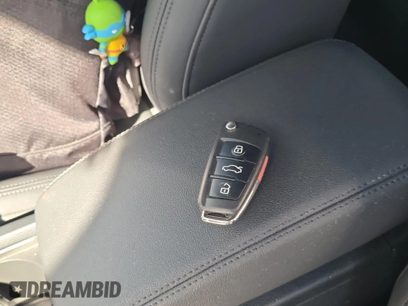 2023 Audi Q3 S line Premium with VIN WA1DECF34P1106228, listed as a IAAI auction lot 42734425 with 52,167 mi miles and . Bid and sale history available at DreamBid. Image 39.