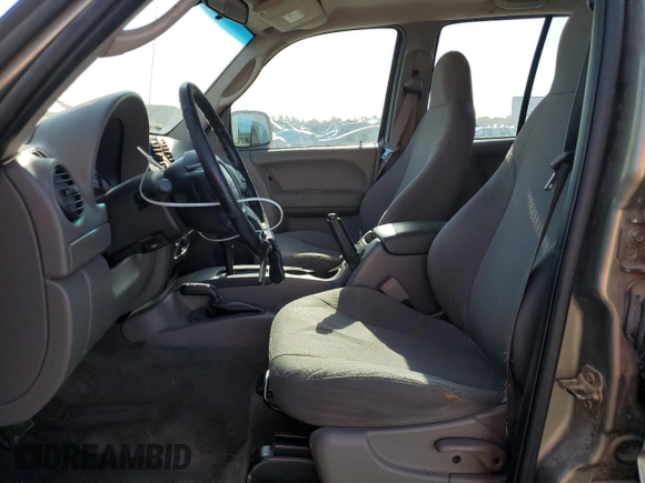 2004 Jeep Liberty Sport with VIN 1J4GL48K34W250008, listed as a Copart auction lot 53067095 with 161,266 mi miles and Salvage Title. Bid and sale history available at DreamBid. Image 7.