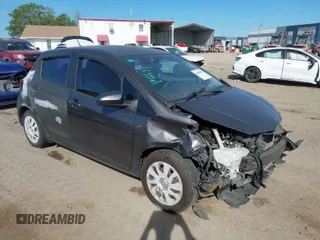 2015 Toyota Yaris L with VIN VNKKTUD31FA027763, listed as a IAAI auction lot 41886803 with 104,889 mi miles. Bid and sale history available at carsss.com. Image 1.