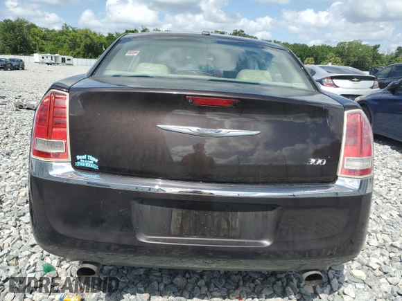 2012 Chrysler 300 Limited z VIN 2C3CCACG9CH173300, wystawiony jako Copart lot #52019775 z przebiegiem 128 492 mil mil oraz Szkoda całkowita • Salvage title. Historia ofert i sprzedaży dostępna na DreamBid. Obrazek 6.
