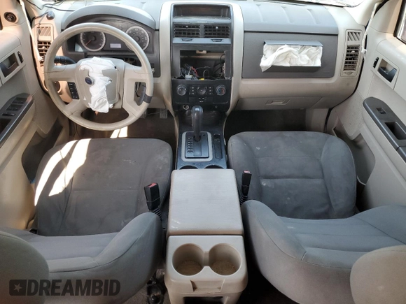 2008 Ford Escape XLS с VIN 1FMCU02Z08KB06103, выставлен на аукционе Copart как лот 60934415 с пробегом Не указан миль и Списание • Salvage title. История ставок и продаж доступна на DreamBid. Изображение 8.