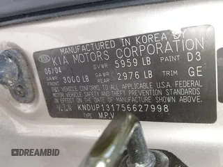 2005 Kia Sedona LX with VIN KNDUP131756627998, listed as a IAAI auction lot 42058213 with 152,433 mi miles. Bid and sale history available at carsss.com. Image 9.
