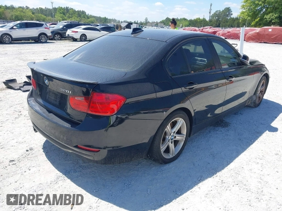 2013 BMW 3 Series 328i with VIN WBA3C1C57DF434854, listed as a IAAI auction lot 42023257 with 125,960 mi miles and . Bid and sale history available at carsss.com. Image 4.