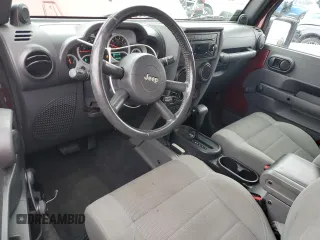 2007 Jeep Wrangler Rubicon с VIN 1J8GA64137L149019, выставлен на аукционе Copart как лот 56499575 с пробегом 146 230 миль миль и Списание • Salvage title. История ставок и продаж доступна на DreamBid. Изображение 8.