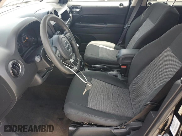 2014 Jeep Patriot Sport with VIN 1C4NJPBA8ED749968, listed as a Copart auction lot 61550455 with 132,892 mi miles and Salvage title. Bid and sale history available at DreamBid. Image 7.