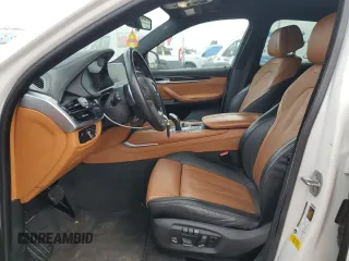2018 BMW X6 sDrive35i with VIN 5UXKU0C5XJ0G80559, listed as a Copart auction lot 79767994 with 68,731 mi miles and Salvage Title. Bid and sale history available at carsss.com. Image 7.