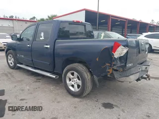 2007 Nissan Titan XE with VIN 1N6BA07AX7N236492, listed as a IAAI auction lot 41668602 with 205,028 mi miles. Bid and sale history available at carsss.com. Image 3.