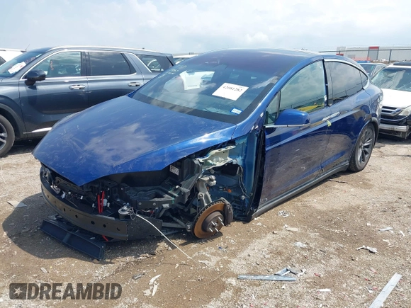 2018 Tesla Model X 75D with VIN 5YJXCAE21JF132628, listed as a IAAI auction lot 42081282 with 35,360 mi miles and . Bid and sale history available at carsss.com. Image 2.