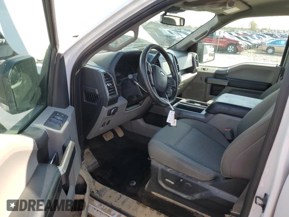 2019 Ford F-150 XL with VIN 1FTEW1E57KKE02961, listed as a Copart auction lot 52257105 with 117,296 mi miles and Salvage Title. Bid and sale history available at carsss.com. Image 8.