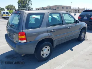 2004 Ford Escape XLS with VIN 1FMYU92194KA15054, listed as a IAAI auction lot 42772942 with 157,270 mi miles and . Bid and sale history available at DreamBid. Image 4.