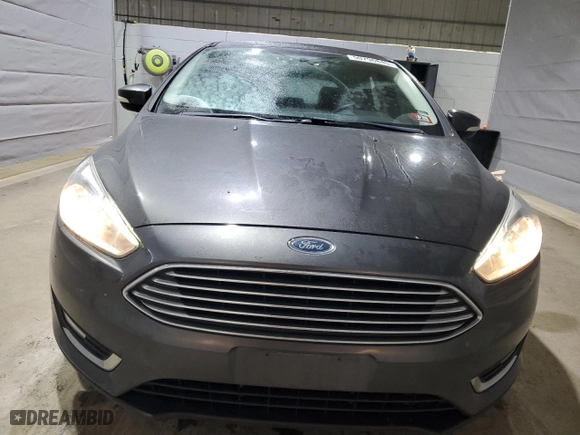 2015 Ford Focus Titanium with VIN 1FADP3N2XFL321128, listed as a Copart auction lot 50796845 with 156,700 mi miles and Clean Title. Bid and sale history available at carsss.com. Image 5.