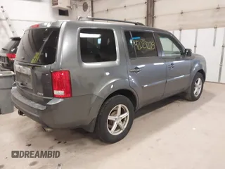 2011 Honda Pilot EX-L with VIN 5FNYF4H55BB039079, listed as a IAAI auction lot 42029278 with 173,216 mi miles. Bid and sale history available at carsss.com. Image 4.