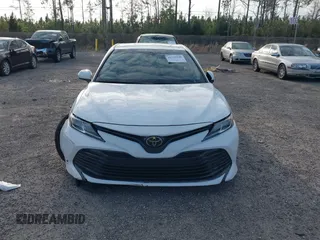 2019 Toyota Camry LE with VIN 4T1B11HK7KU806197, listed as a IAAI auction lot 41721148 with 83,373 mi miles and . Bid and sale history available at DreamBid. Image 12.