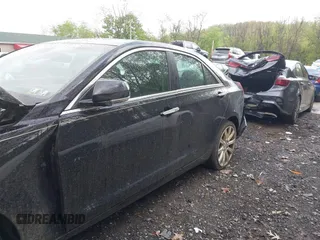2013 Cadillac ATS Premium AWD z VIN 1G6AL5S36D0111869, wystawiony jako IAAI lot #42199637 z przebiegiem 148 404 mil mil oraz . Historia ofert i sprzedaży dostępna na DreamBid. Obrazek 12.