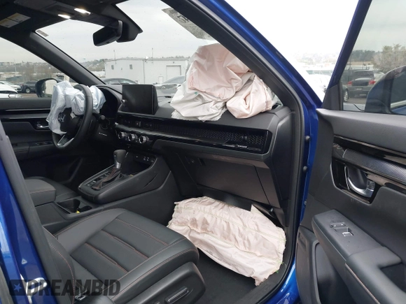 2025 Honda CR-V Sport Touring with VIN 2HKRS6H99SH807839, listed as a IAAI auction lot 42029547 with 5,979 mi miles and . Bid and sale history available at DreamBid. Image 5.