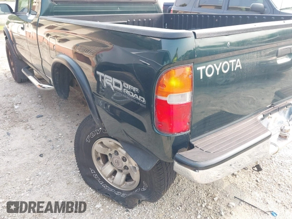 1999 Toyota Tacoma PreRunner z VIN 4TASM92N7XZ505612, wystawiony jako IAAI lot #42413856 z przebiegiem 131 140 mil mil oraz . Historia ofert i sprzedaży dostępna na DreamBid. Obrazek 6.
