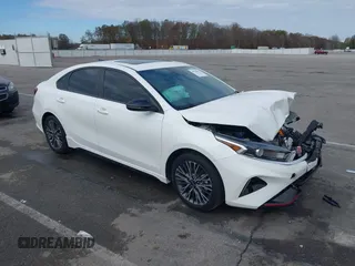 2023 Kia Forte GT-Line z VIN 3KPF54AD0PE670069, wystawiony jako IAAI lot #40784353 z przebiegiem 10 839 mil mil oraz . Historia ofert i sprzedaży dostępna na DreamBid. Obrazek 1.