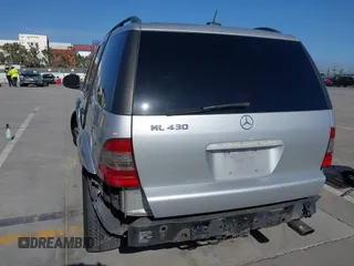 2001 Mercedes-Benz M 320/430/500 z VIN 4JGAB72E21A253005, wystawiony jako IAAI lot #42337921 z przebiegiem 171 529 mil mil oraz . Historia ofert i sprzedaży dostępna na DreamBid. Obrazek 6.
