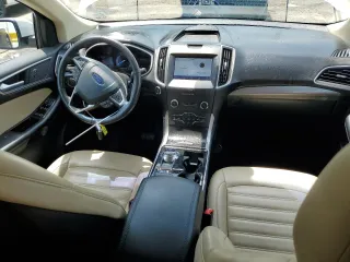 2020 Ford Edge SEL z VIN 2FMPK3J99LBA57125, wystawiony jako Copart lot #59915095 z przebiegiem 101 081 mil mil oraz Szkoda całkowita • Salvage title. Historia ofert i sprzedaży dostępna na DreamBid. Obrazek 8.