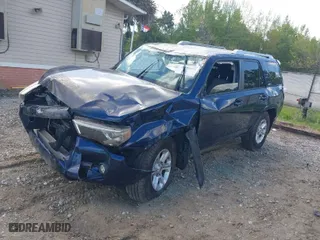 2016 Toyota 4Runner SR5 with VIN JTEZU5JR6G5145378, listed as a IAAI auction lot 41980892 with 164,373 mi miles. Bid and sale history available at carsss.com. Image 2.