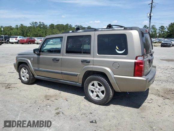 2006 Jeep Commander with VIN 1J8HG48N06C274675, listed as a Copart auction lot 54521835 with 134,587 mi miles and Salvage Title. Bid and sale history available at DreamBid. Image 2.
