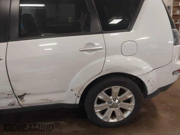 2007 Mitsubishi Outlander XLS with VIN JA4MT41X17Z020401, listed as a IAAI auction lot 41572756 with 43,696 mi miles. Bid and sale history available at carsss.com. Image 12.