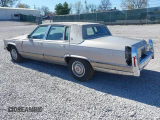 1992 Cadillac Brougham z VIN 1G6DW5477NR702648, wystawiony jako IAAI lot #41863168 z przebiegiem 108 158 mil mil oraz . Historia ofert i sprzedaży dostępna na DreamBid. Obrazek 3.