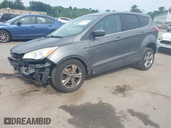 2014 Ford Escape SE with VIN 1FMCU9G97EUB27835, listed as a IAAI auction lot 42530986 with 137,933 mi miles and . Bid and sale history available at DreamBid. Image 2.